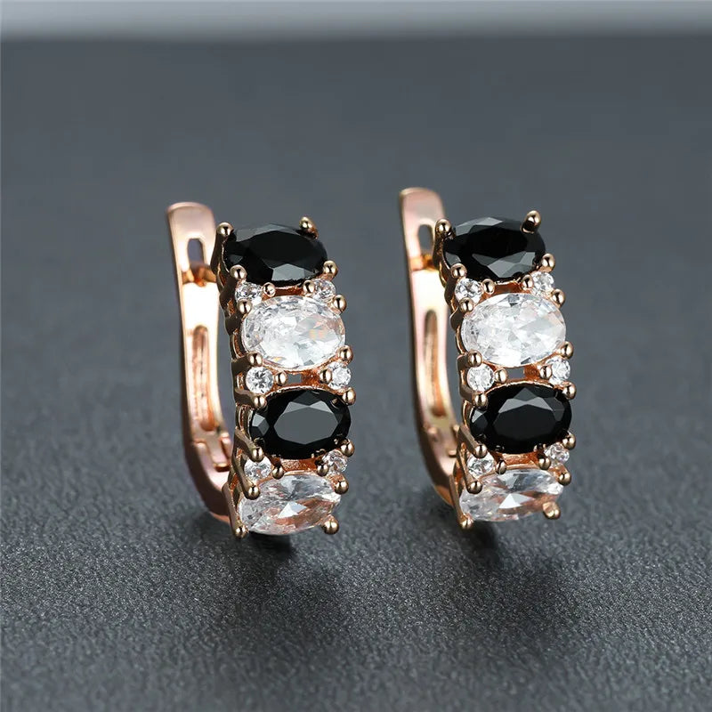 Noirelle Black and White Oval Hoop Earrings styled view