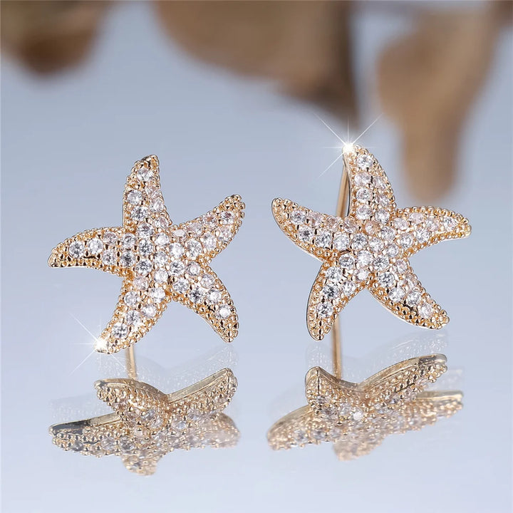 Leuke vrouwelijke steen witte kristallen zeester oorbellen gouden kleur bruiloft sieraden voor vrouwen