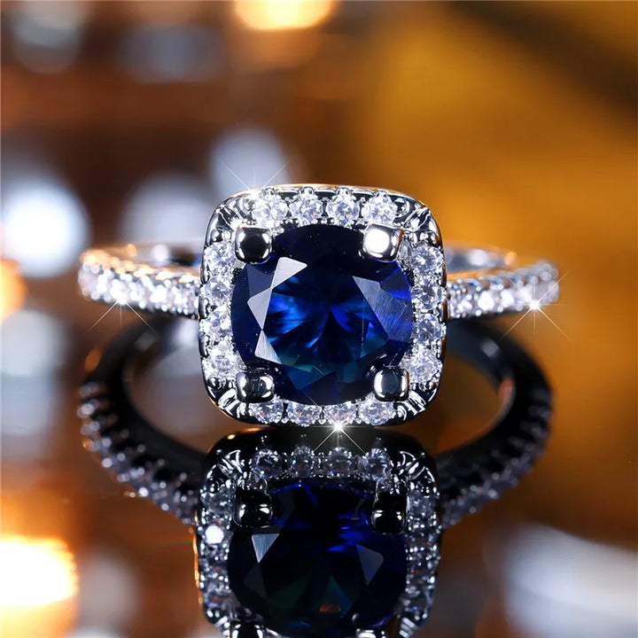 Luxe Vrouwelijke Blauwe Ronde Zirkoon Stenen Ring Trendy Zilveren Kleur Engagement Leuke Bruid Bruiloft Sieraden Cadeau Voor Vrouwen