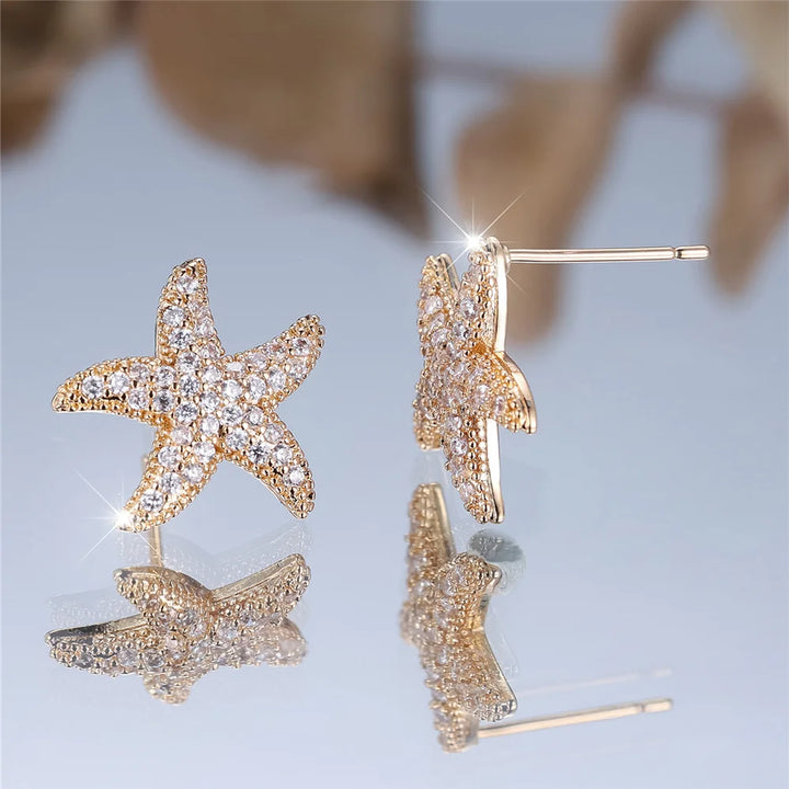 Leuke vrouwelijke steen witte kristallen zeester oorbellen gouden kleur bruiloft sieraden voor vrouwen