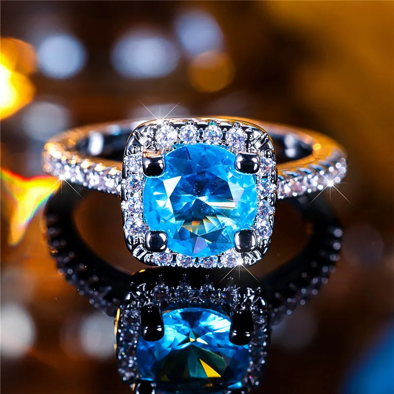 Luxe Vrouwelijke Blauwe Ronde Zirkoon Stenen Ring Trendy Zilveren Kleur Engagement Leuke Bruid Bruiloft Sieraden Cadeau Voor Vrouwen