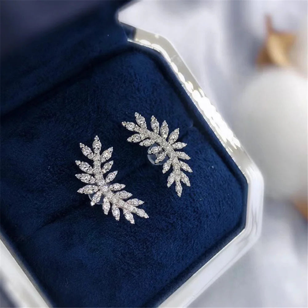 Plume Heart Crystal Earrings styled view