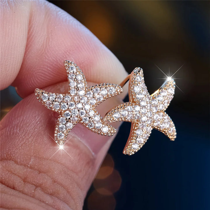 Leuke vrouwelijke steen witte kristallen zeester oorbellen gouden kleur bruiloft sieraden voor vrouwen