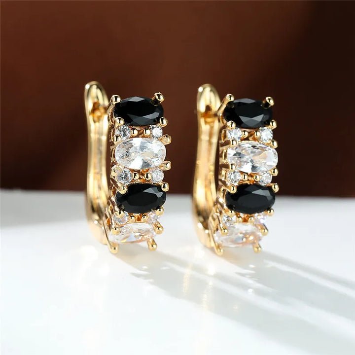 Noirelle Black and White Oval Hoop Earrings hero view